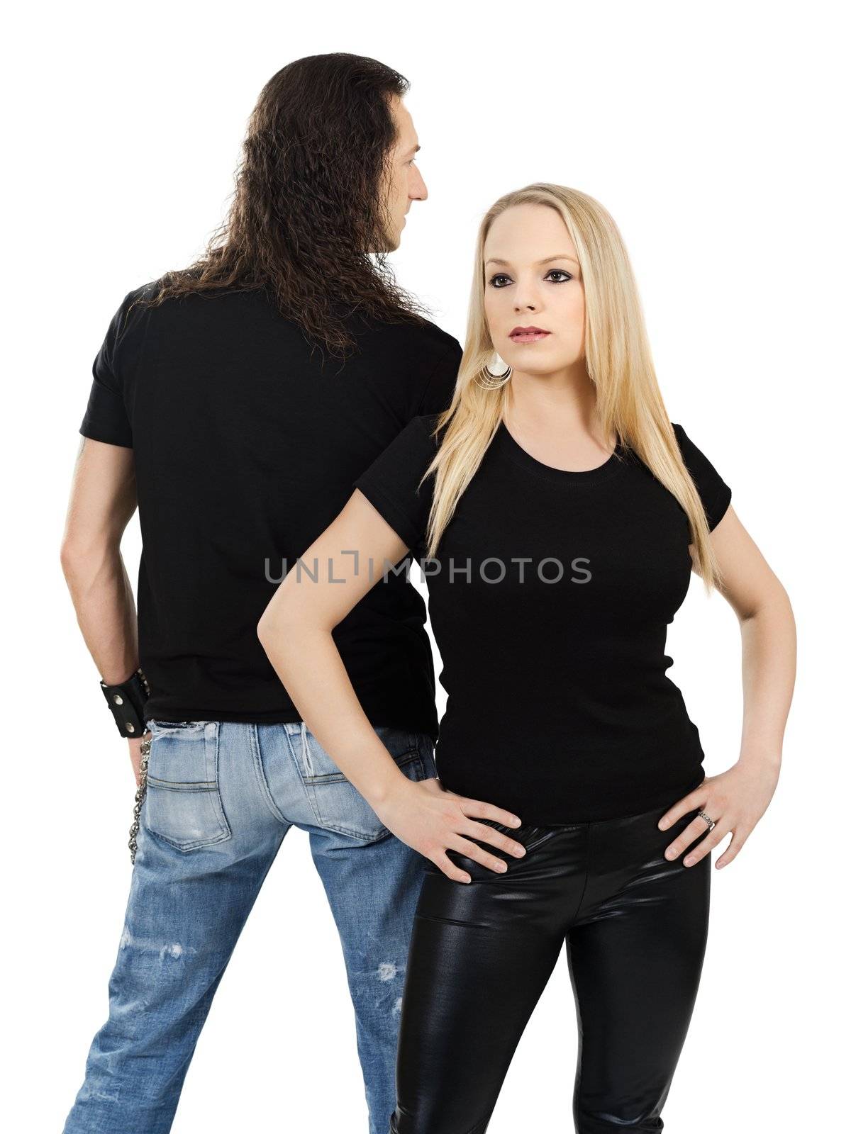 Photo of a man and woman posing with blank black shirts. Male is facing backwards so a custom shirt design can be shown on front and back.
