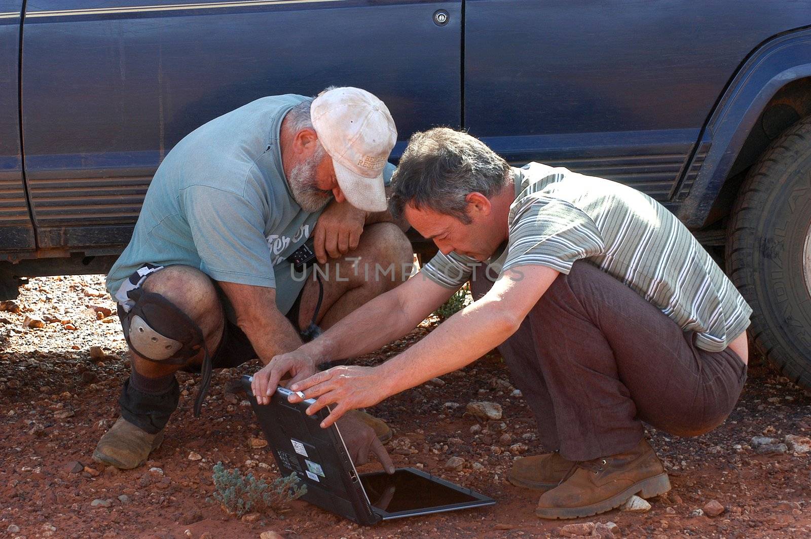 in search of the good road in the Australian bush using a gps connected to a laptop.