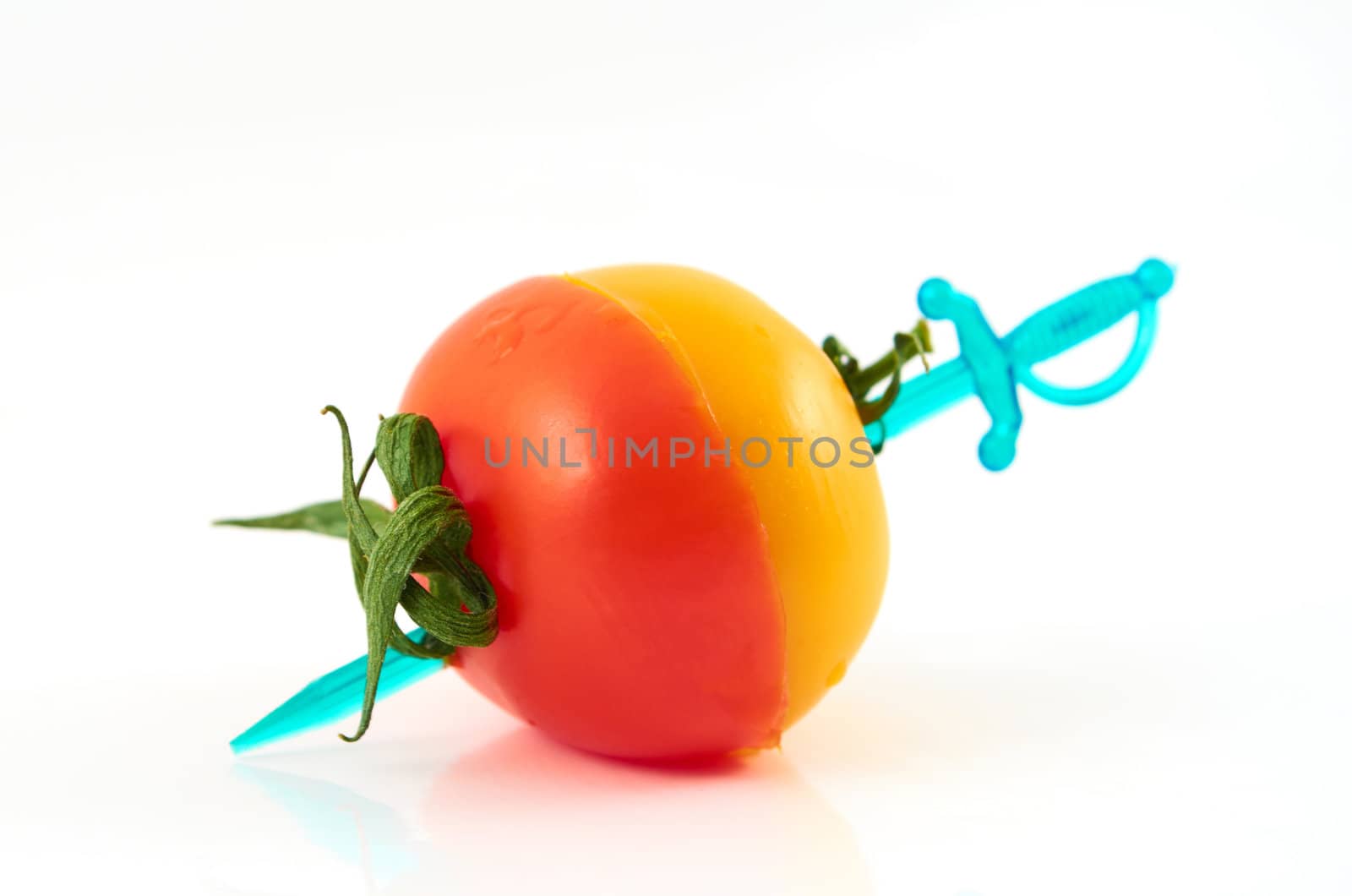 Juicy ripe yellow tomato  on a white background