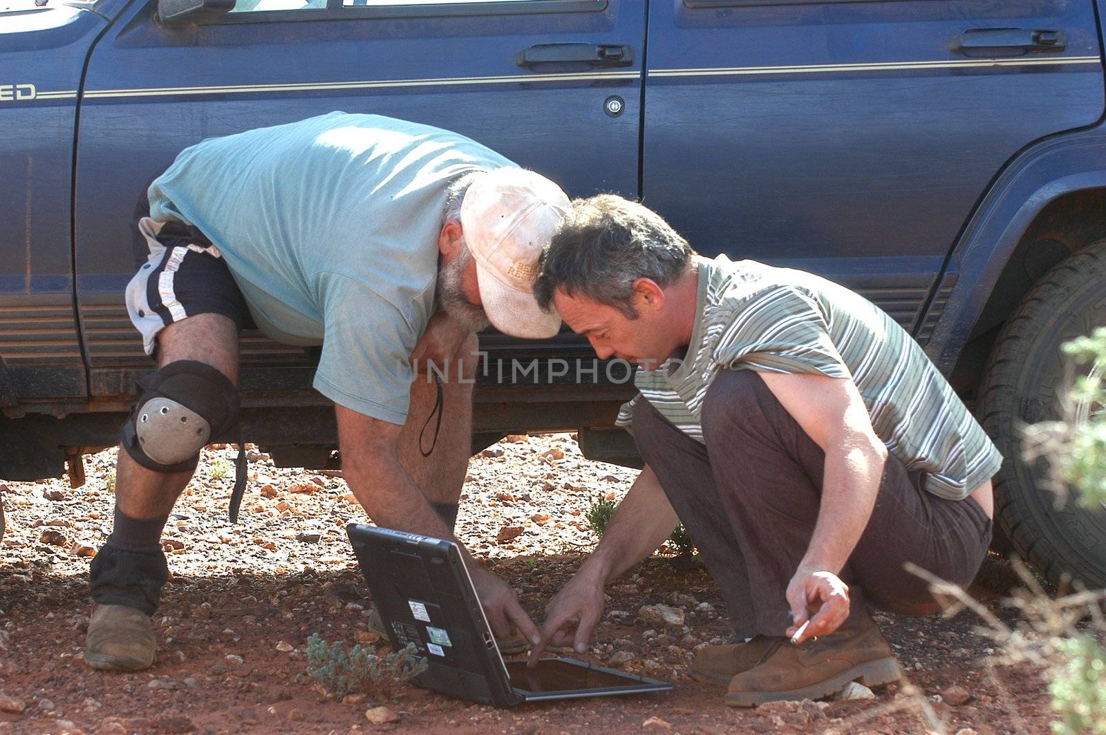 in search of the good road in the Australian bush using a gps connected to a laptop.