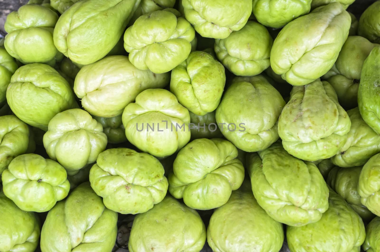 Full frame of bunch of sayote on a countryside vegetable stand