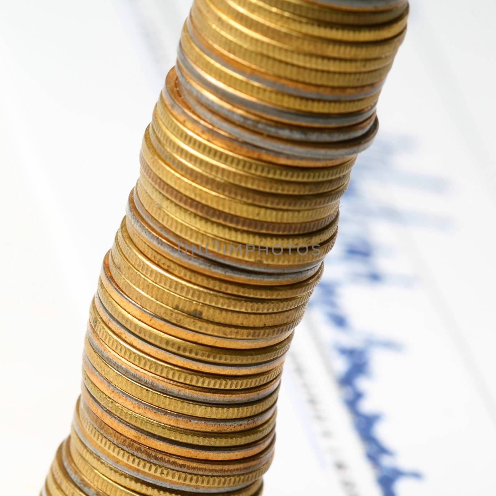 coins and financial graph on background