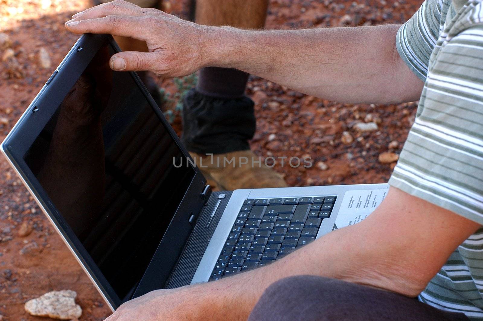 in search of the good road in the Australian bush using a gps connected to a laptop.