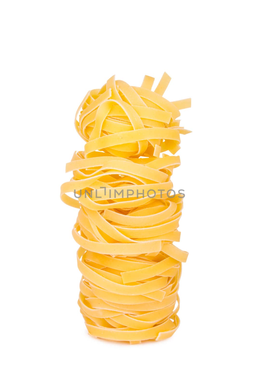 Italian pasta: tagliatelle, isolated on white background