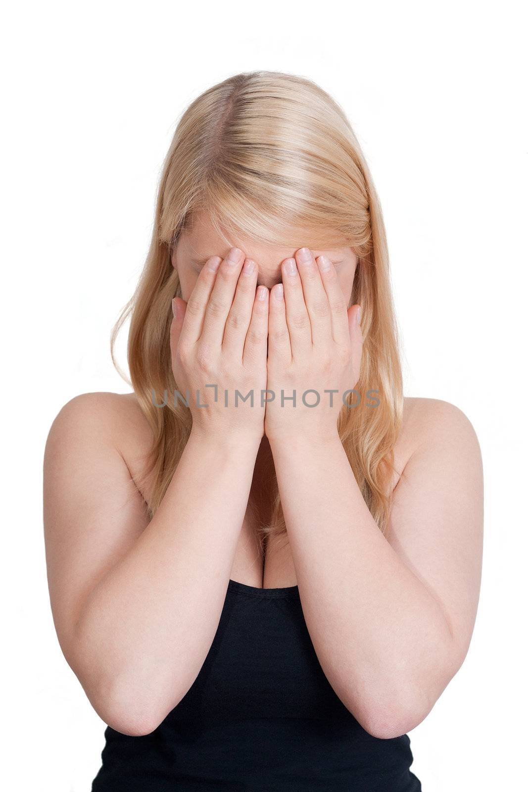 young blonde woman is frustrated - isolated on white background