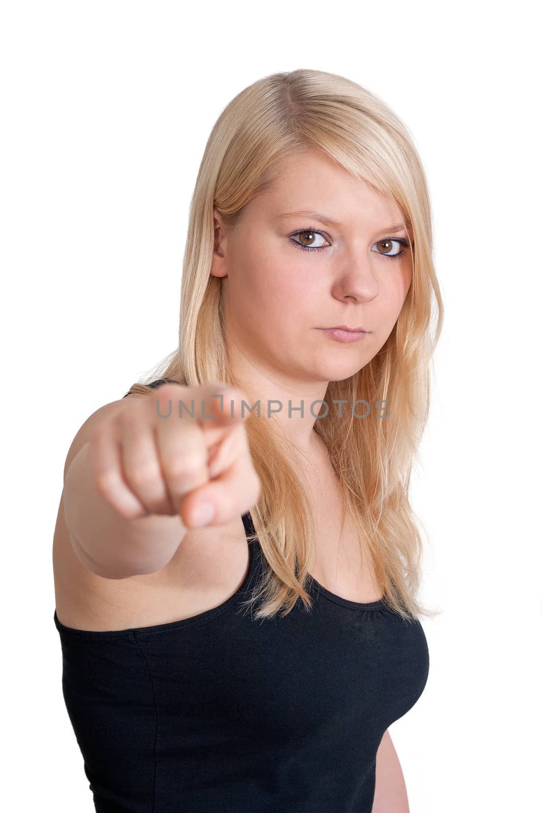 young blonde woman is pointing her forefinger to something - isolated on white background