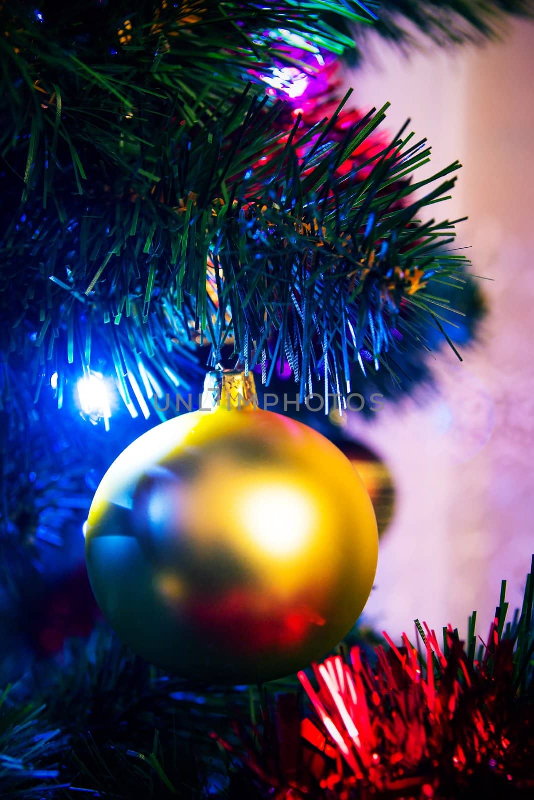 Christmas tree with christmas golden bauble 