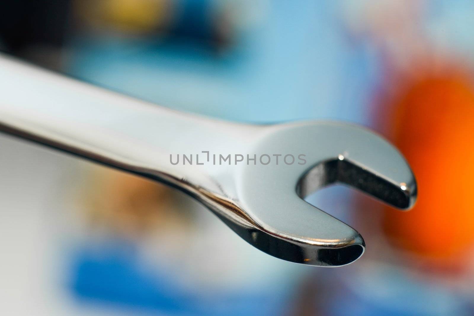silver spanner close up on a blur background