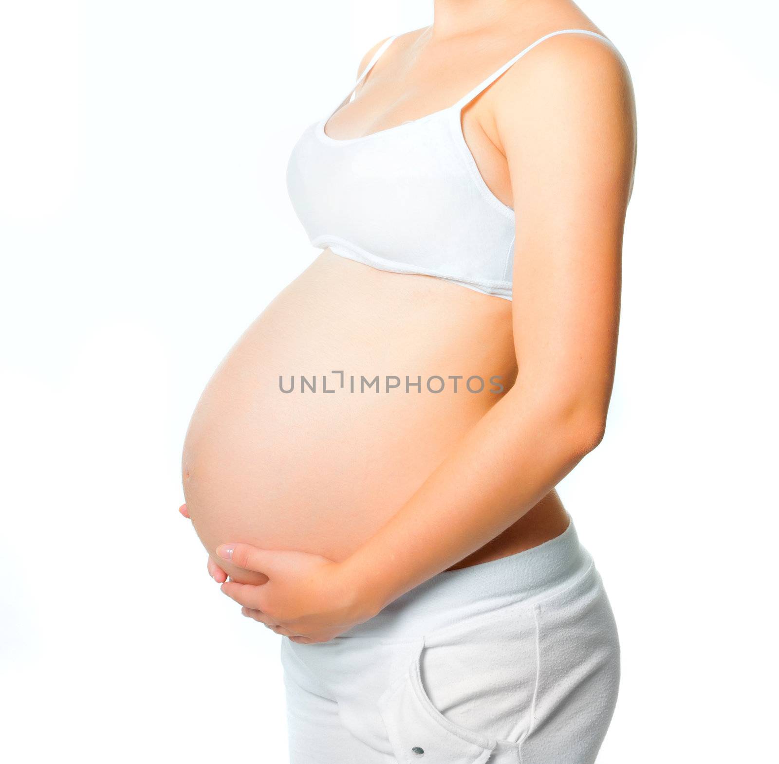 pregnant young woman isolated on a white