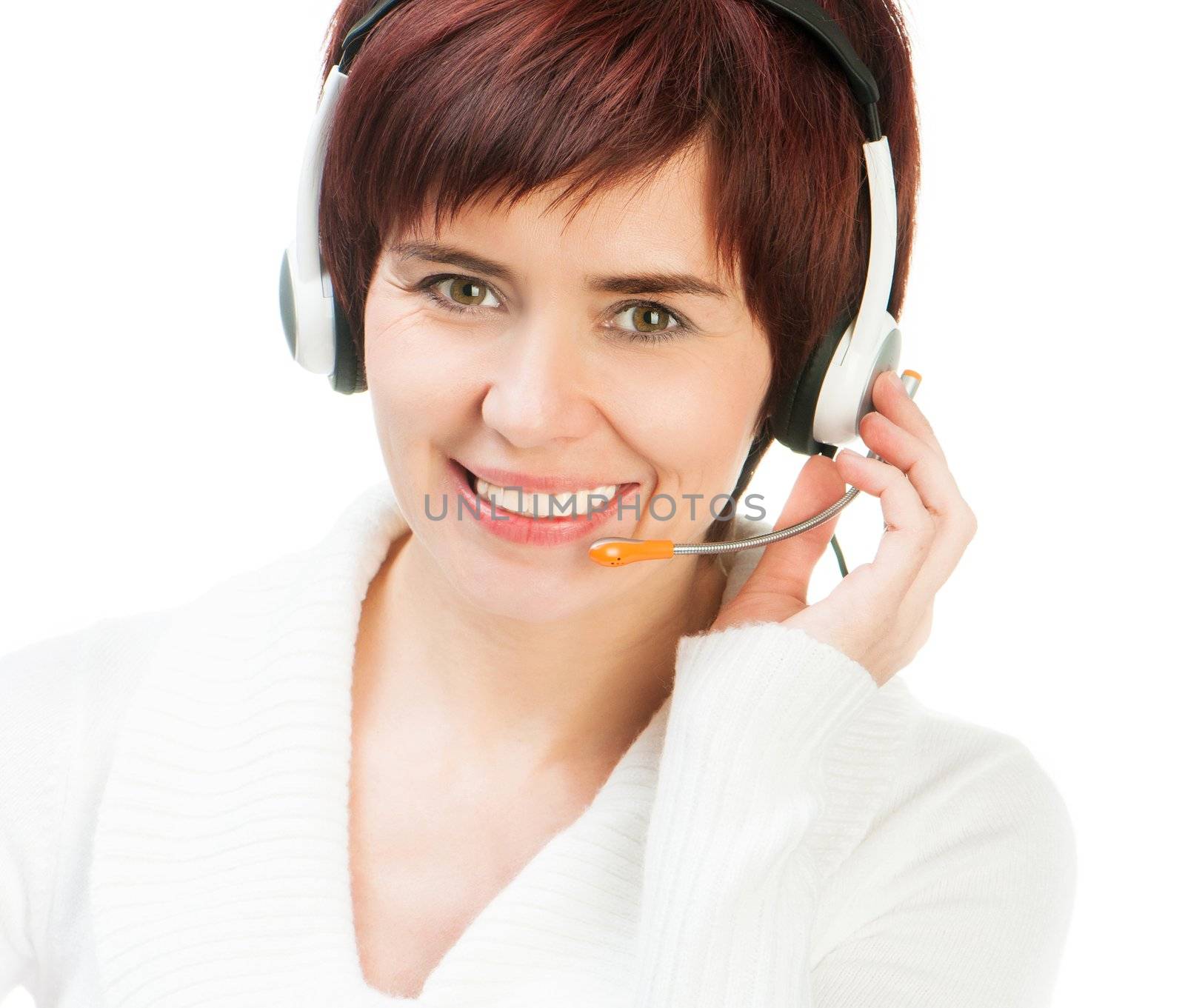Smiling Young Female Wearing A Headset Against White
