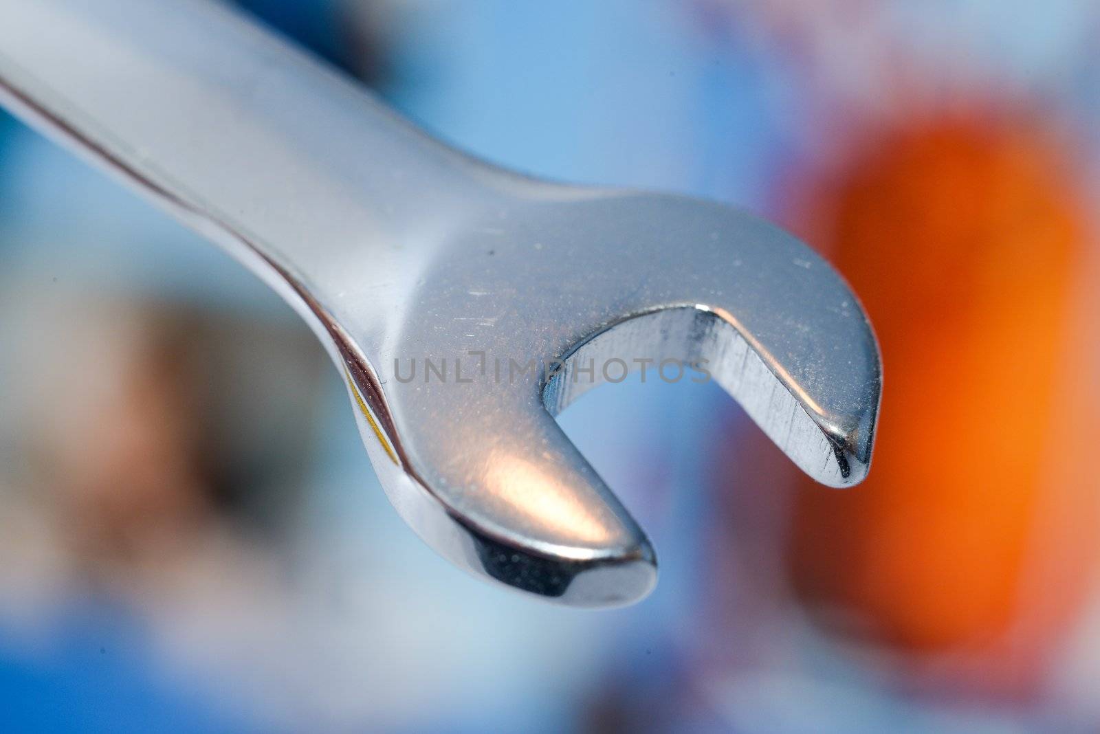 silver spanner close up on a blur background