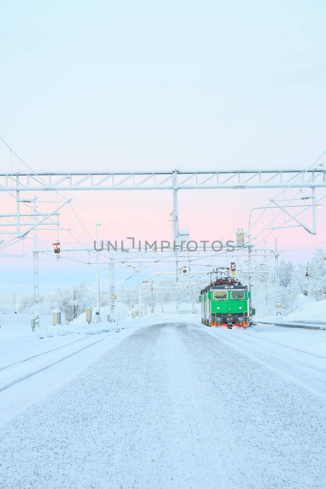 Green Train Locomotive at Kiruna Platform Station terminal Sweden
