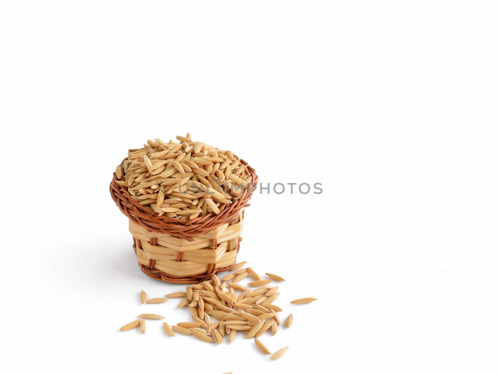 paddy rice with basket isolated on white.