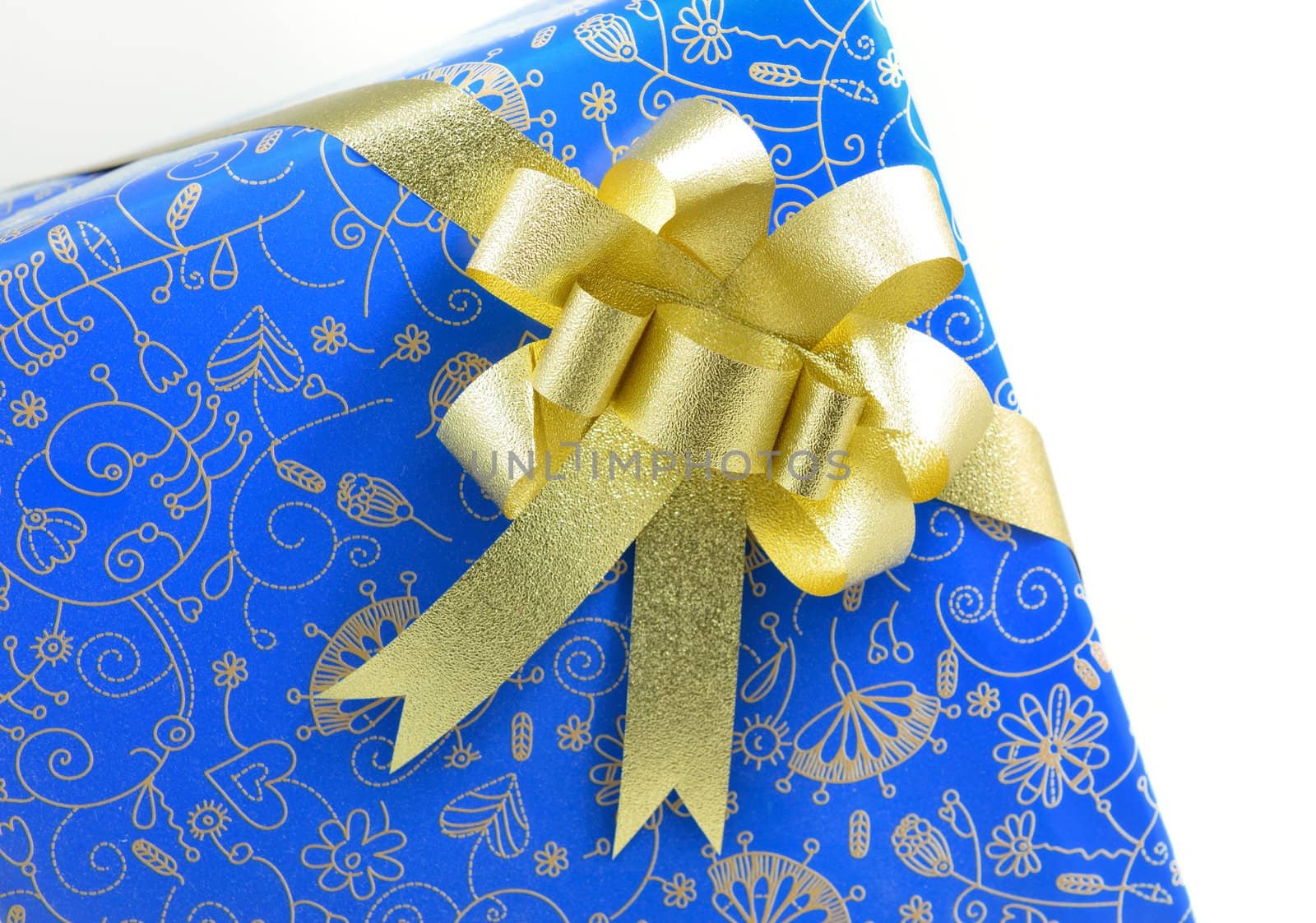blue gift box with golden ribbon