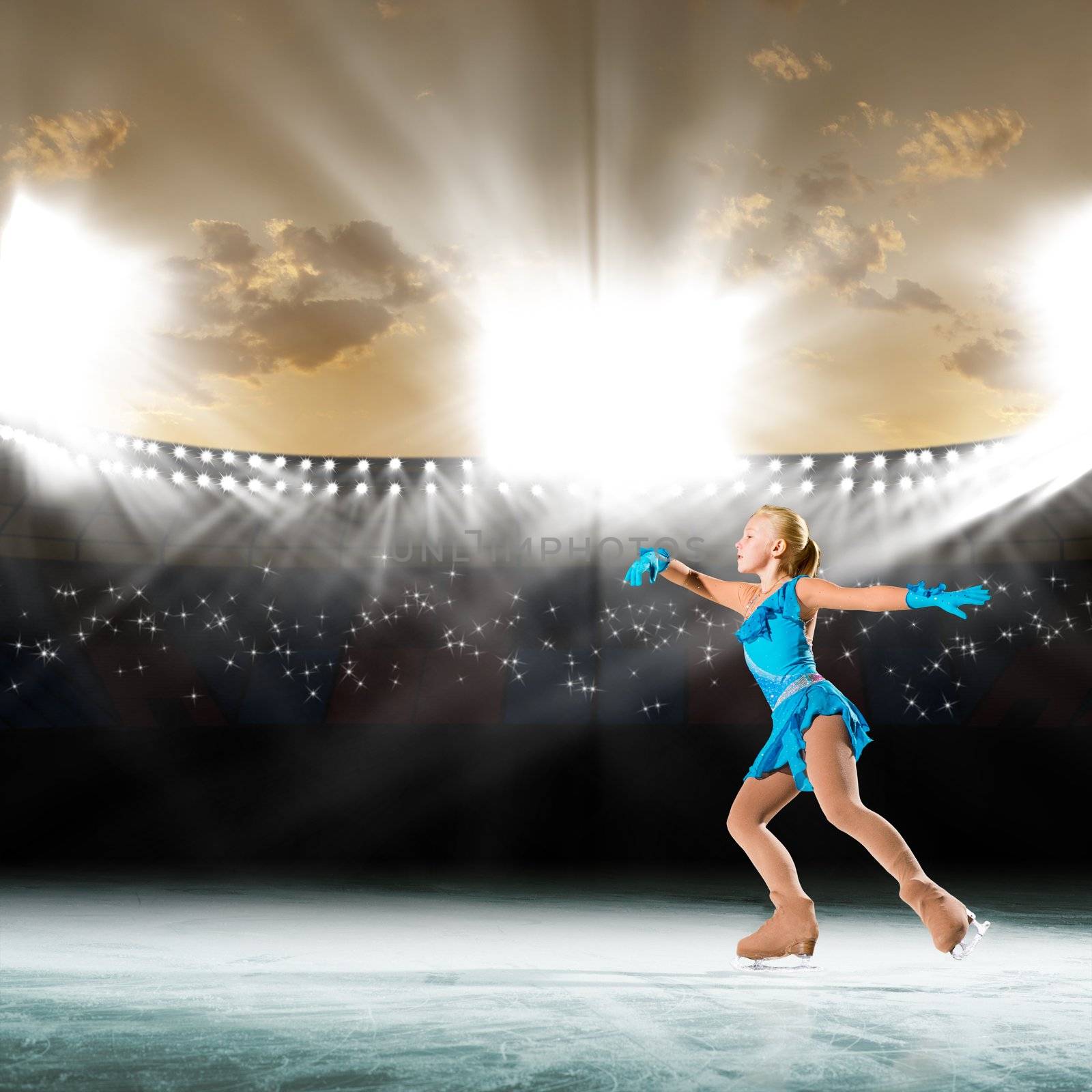 young skater performs on the ice in the background lights lighting