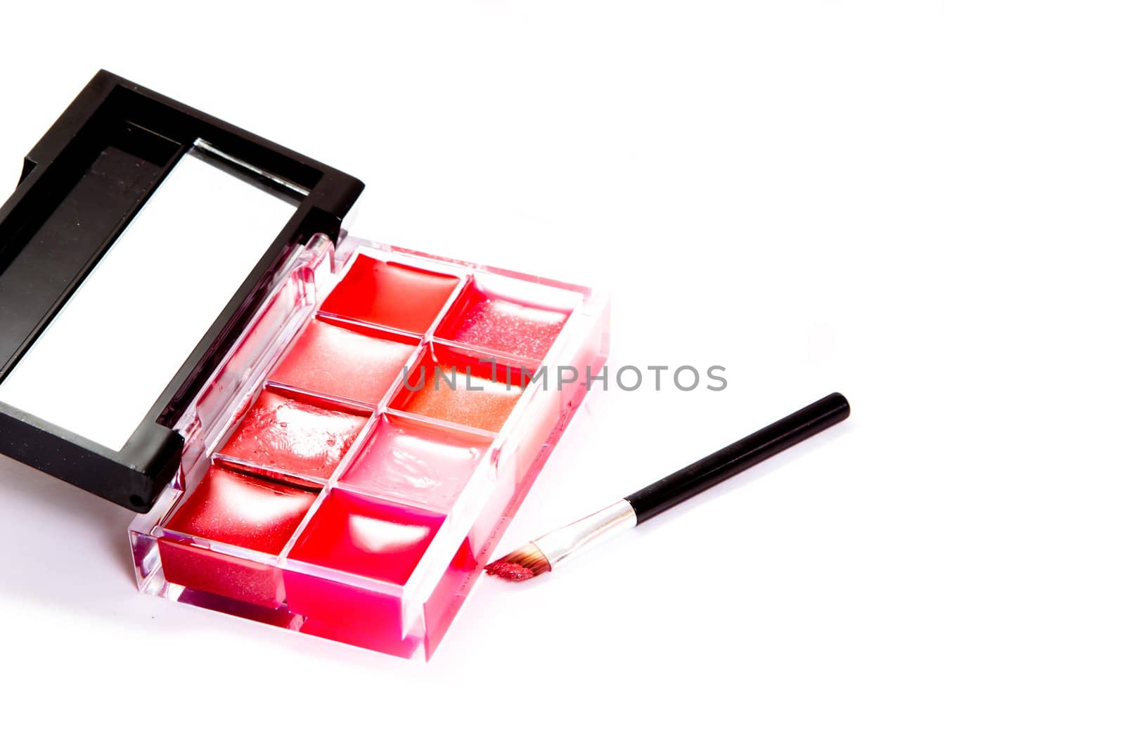 profesional lipstick with brush on white background