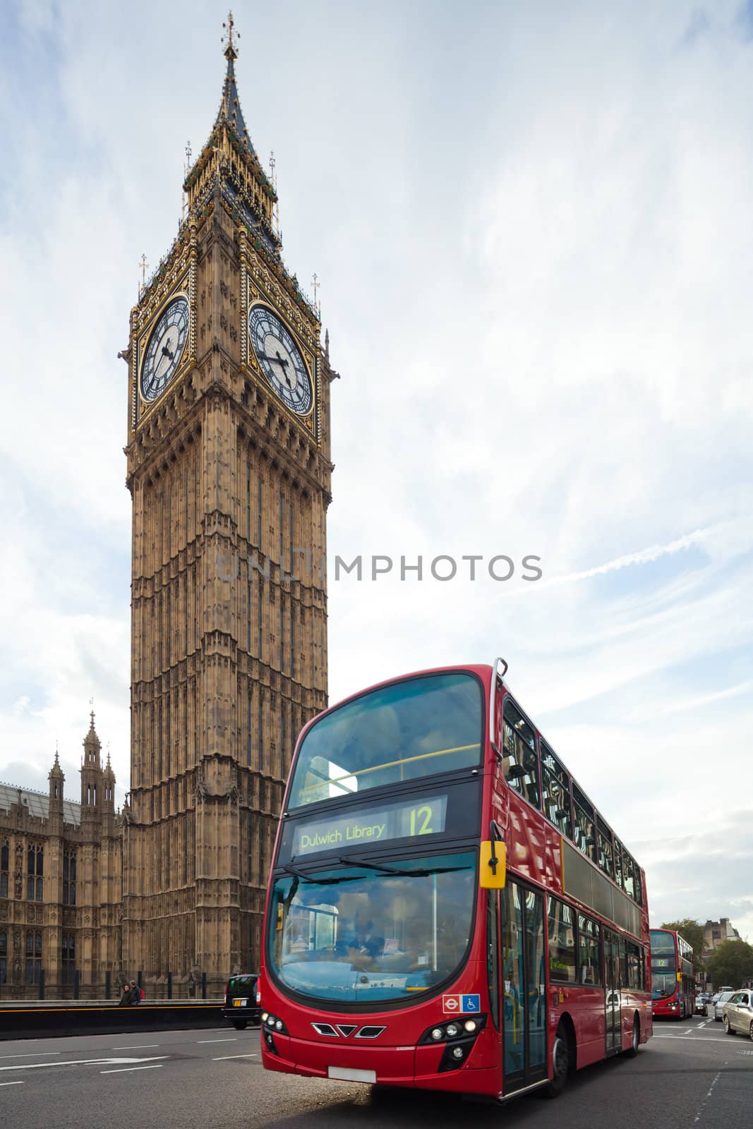 Big Ben with red double-decker in London, UK  by Antartis