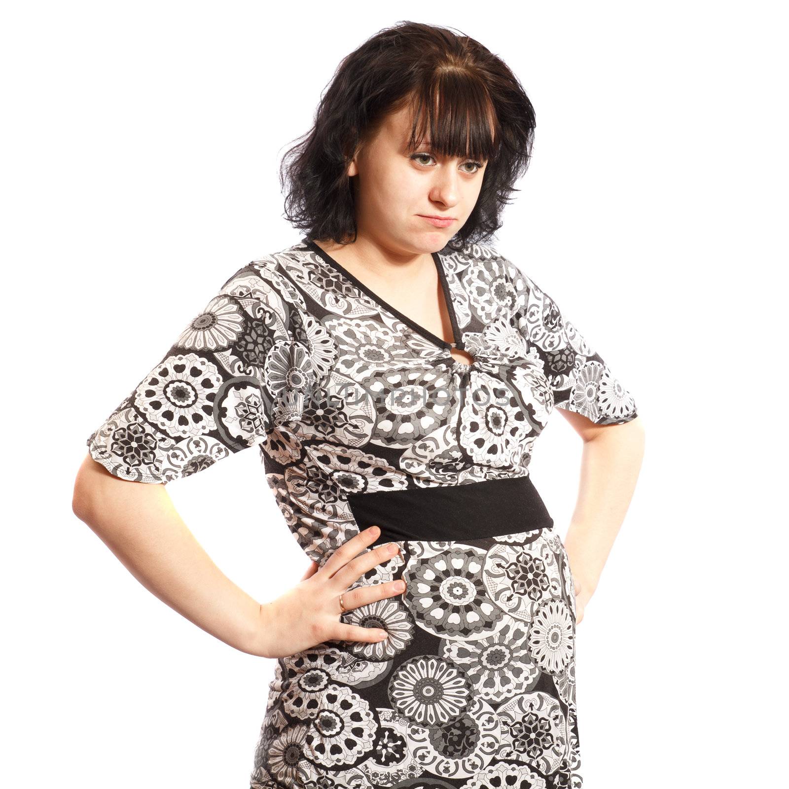 serious pregnant woman looking at something on a white background