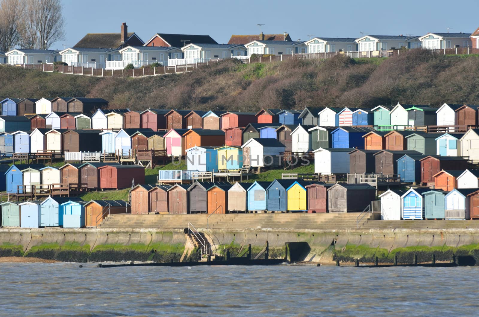 Beach hut and houses and Walton-on-Naze