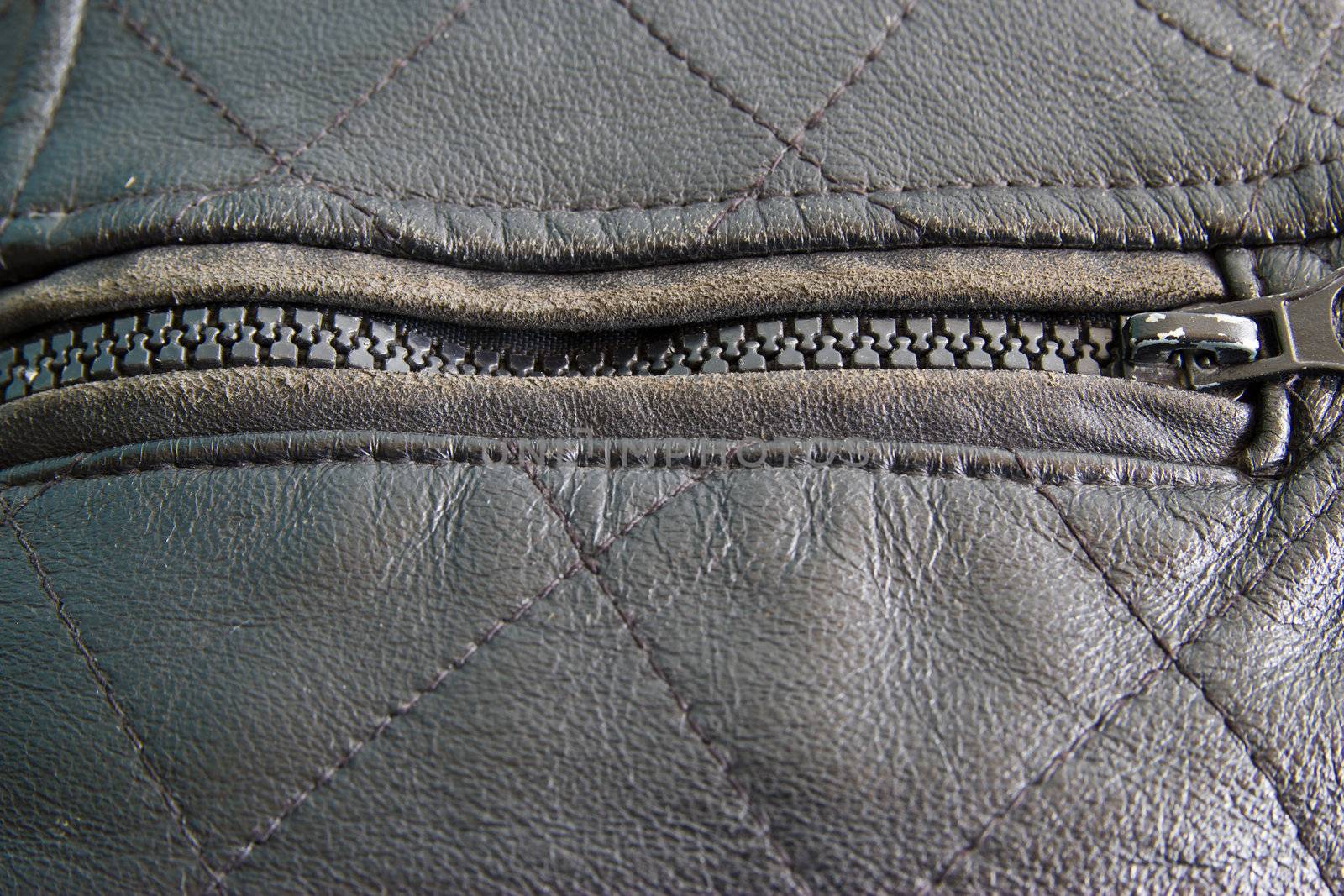 Leather texture colose-up with linear stiches. Part of a leather by wasan_gredpree