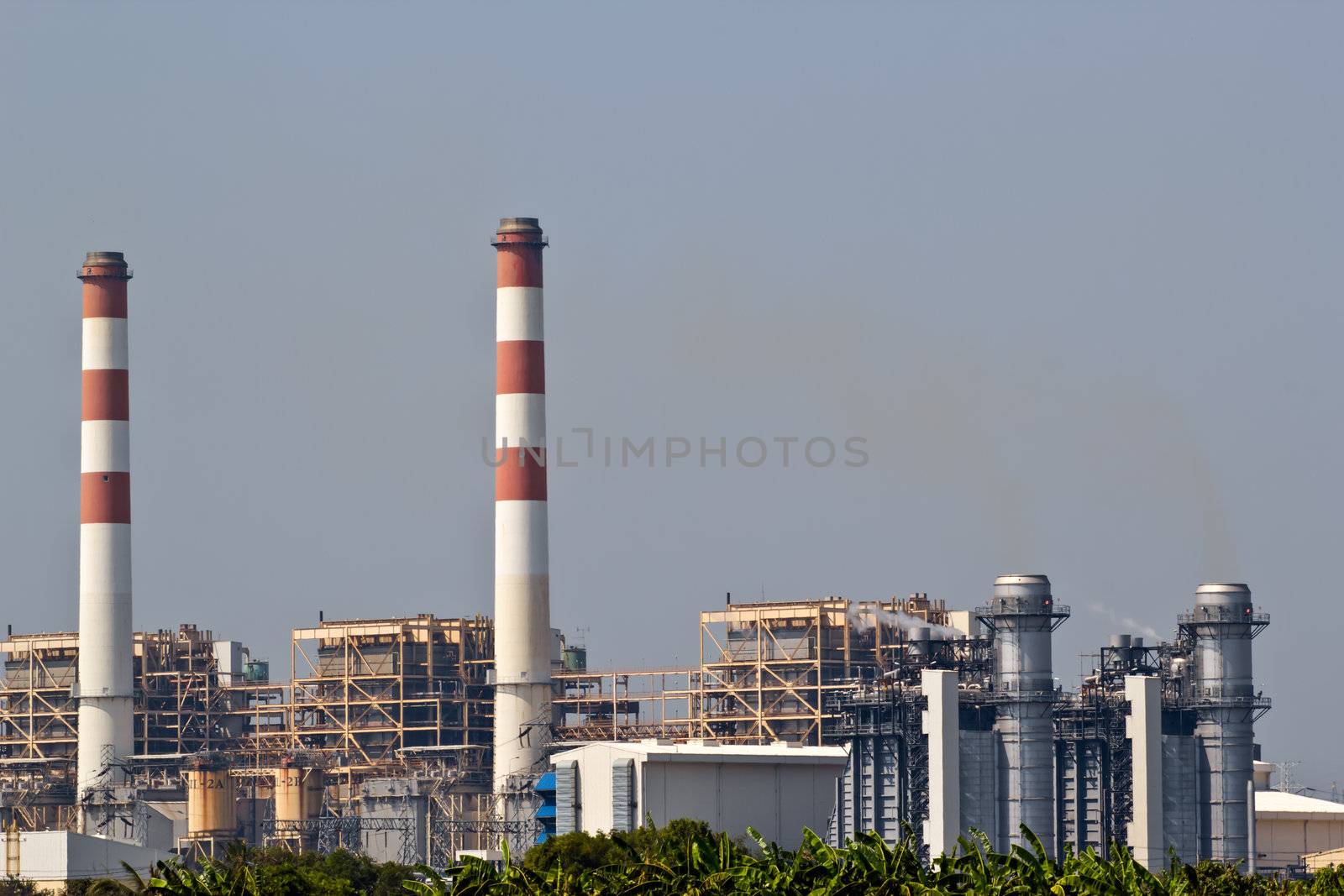 gas turbine electrical power plant at dusk by wasan_gredpree