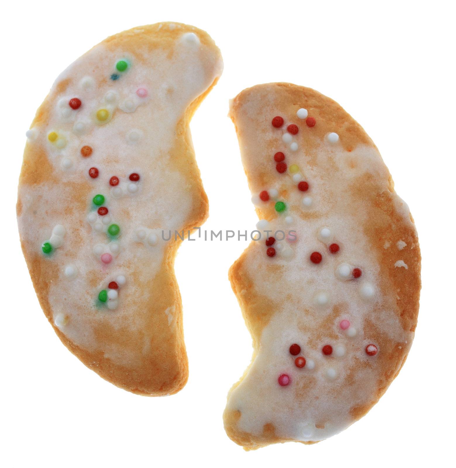 Two traditional moon-shaped cookies isolated against a white background.