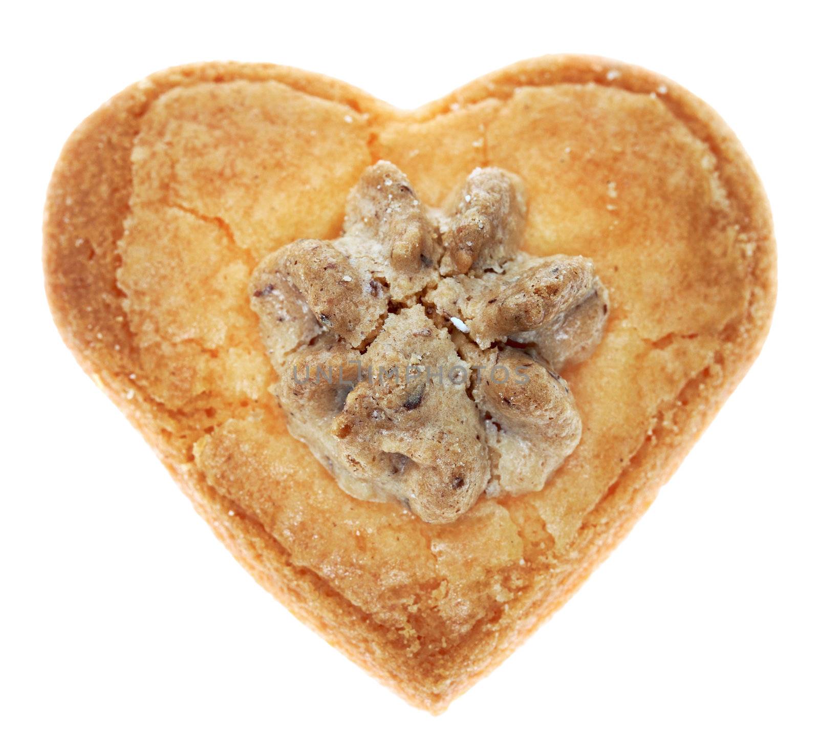 Heart shaped cookie isolated against a white background.
