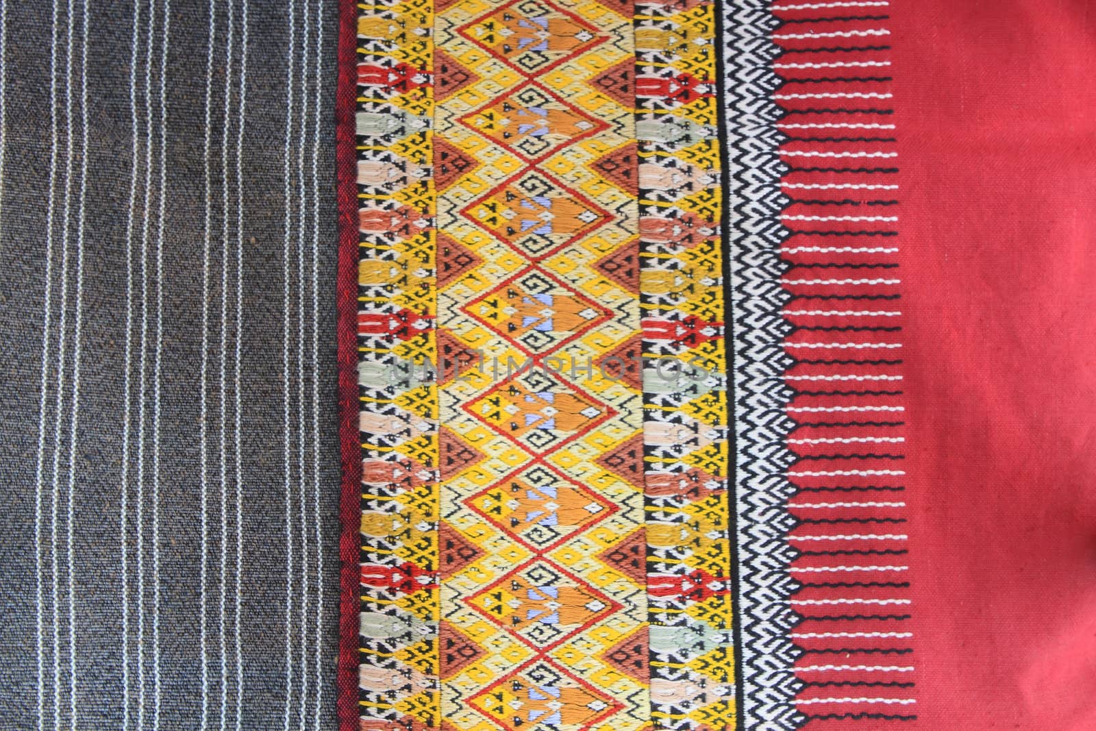 Closeup texture of thai style fabric weave hand-woven   by rufous