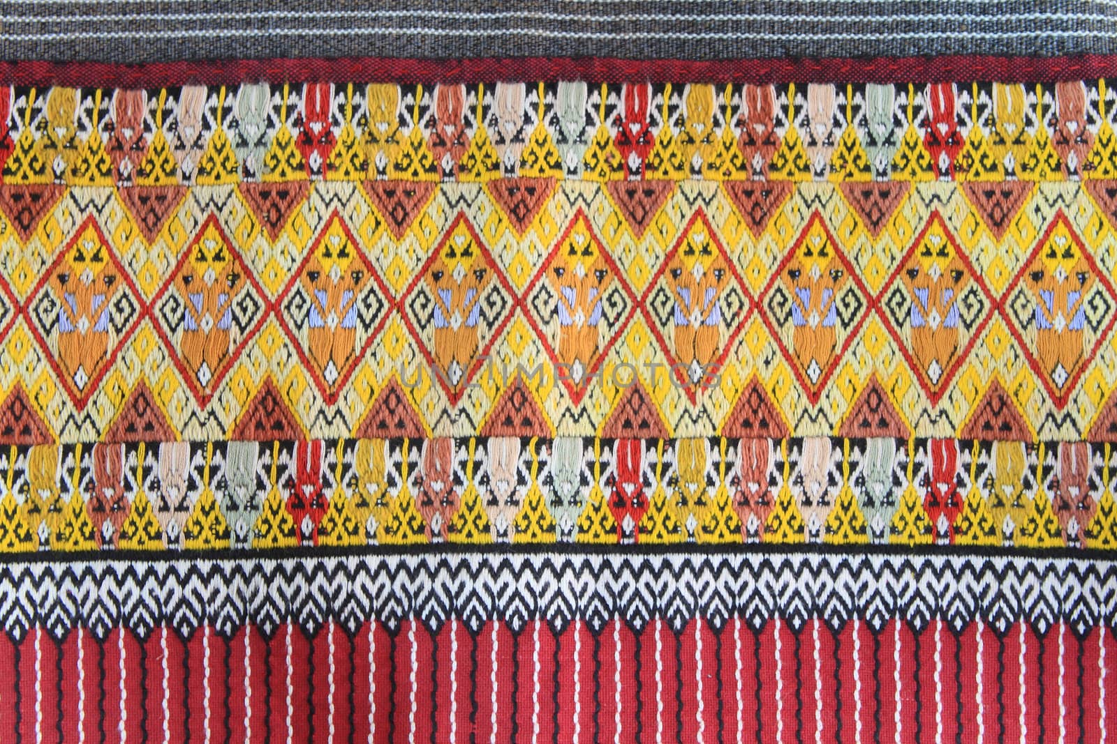 Closeup texture of thai style fabric weave hand-woven   by rufous