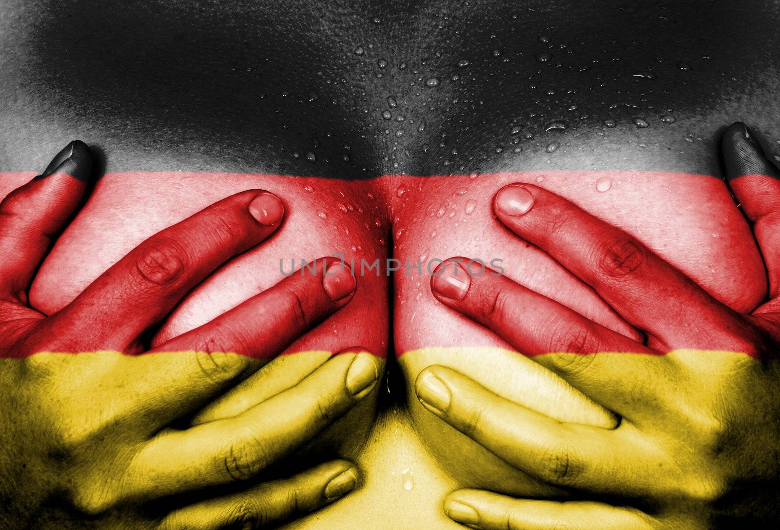 Sweaty upper part of female body, hands covering breasts, flag of Germany