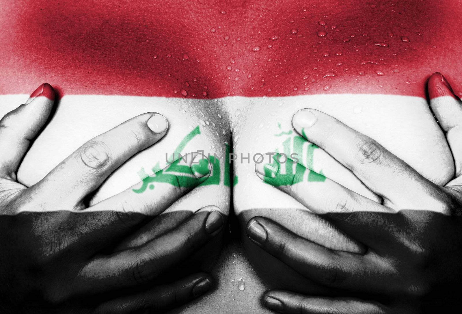 Sweaty upper part of female body, hands covering breasts, flag of Iraq