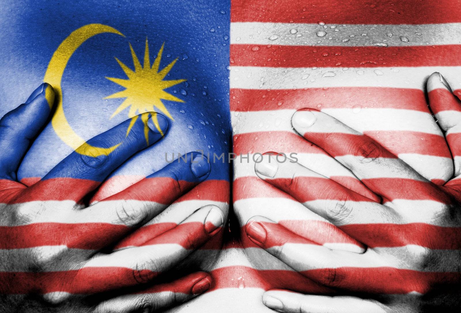 Sweaty upper part of female body, hands covering breasts, flag of Malaysia