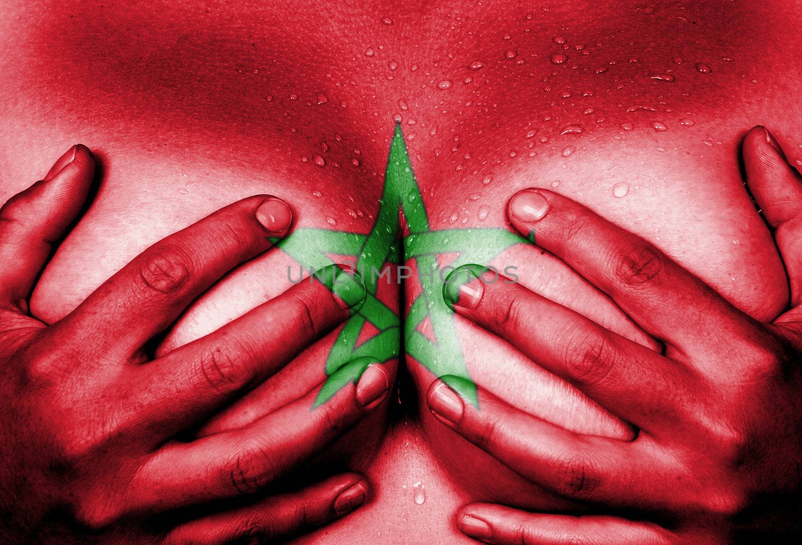 Sweaty upper part of female body, hands covering breasts, flag of Morocco