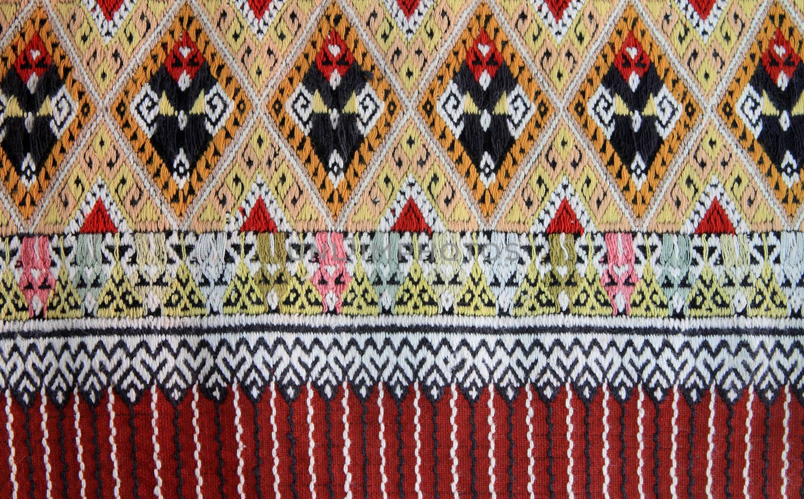 Closeup texture of thai style fabric weave hand-woven