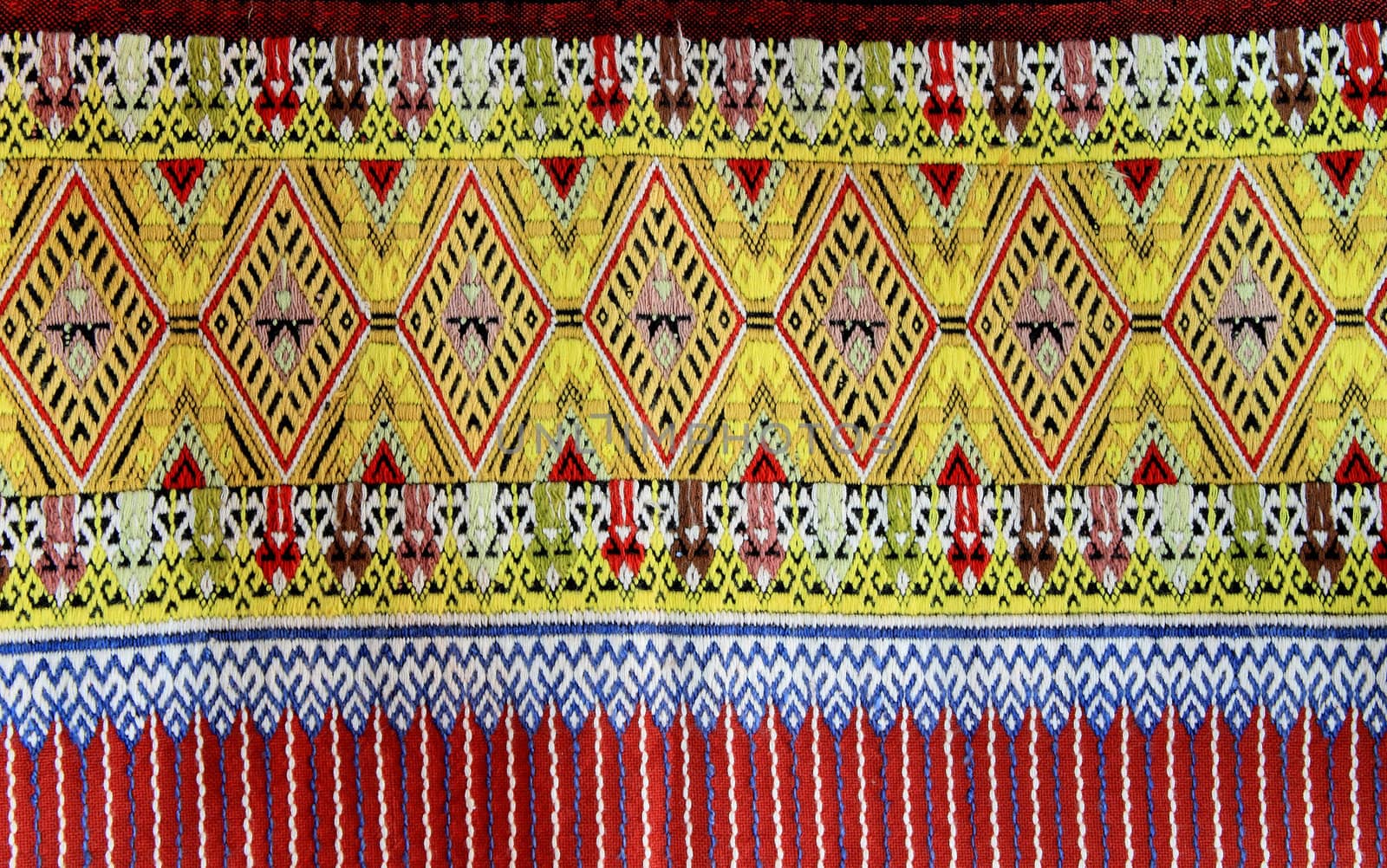 Closeup texture of thai style fabric weave hand-woven