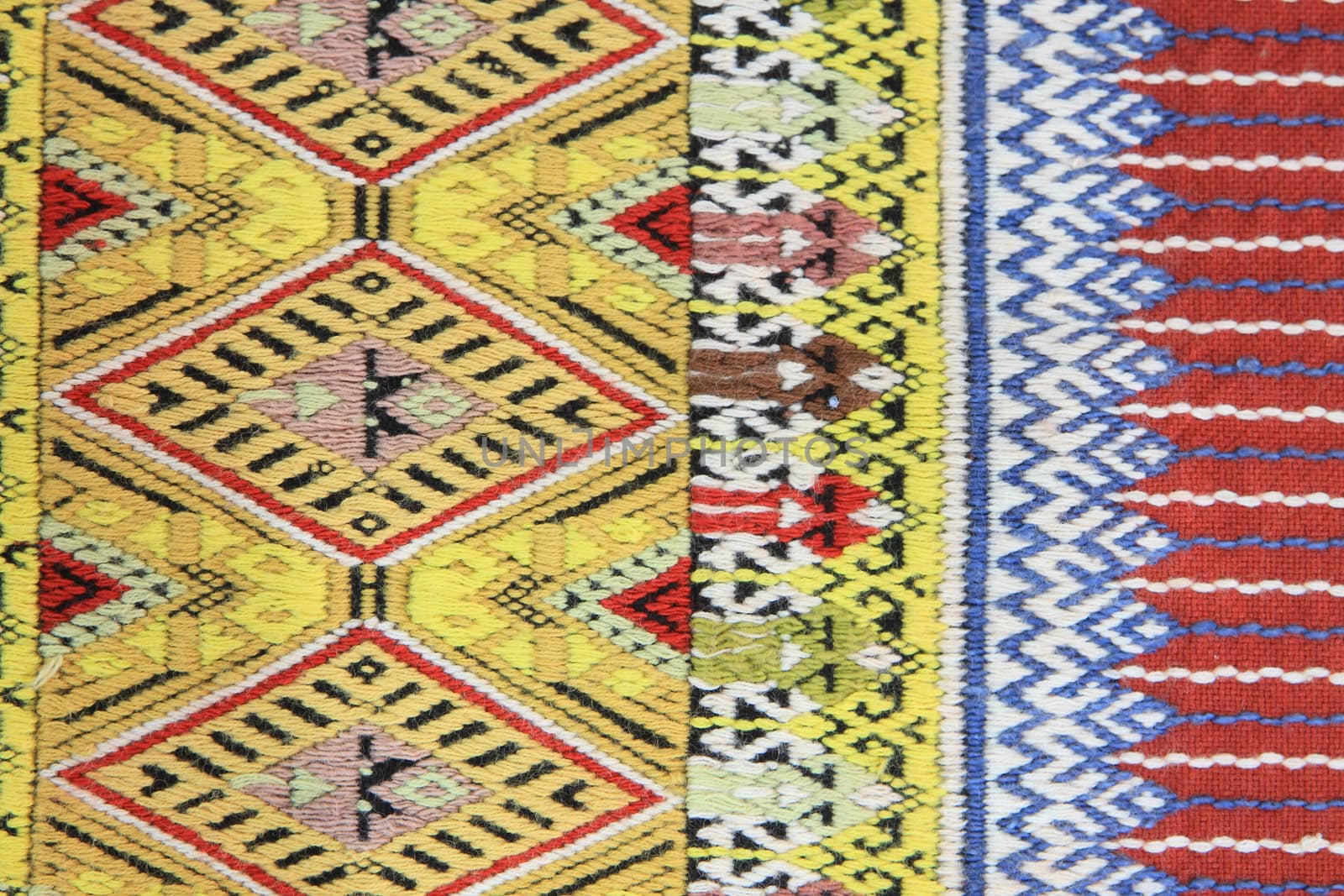 Closeup texture of thai style fabric weave hand-woven   by rufous