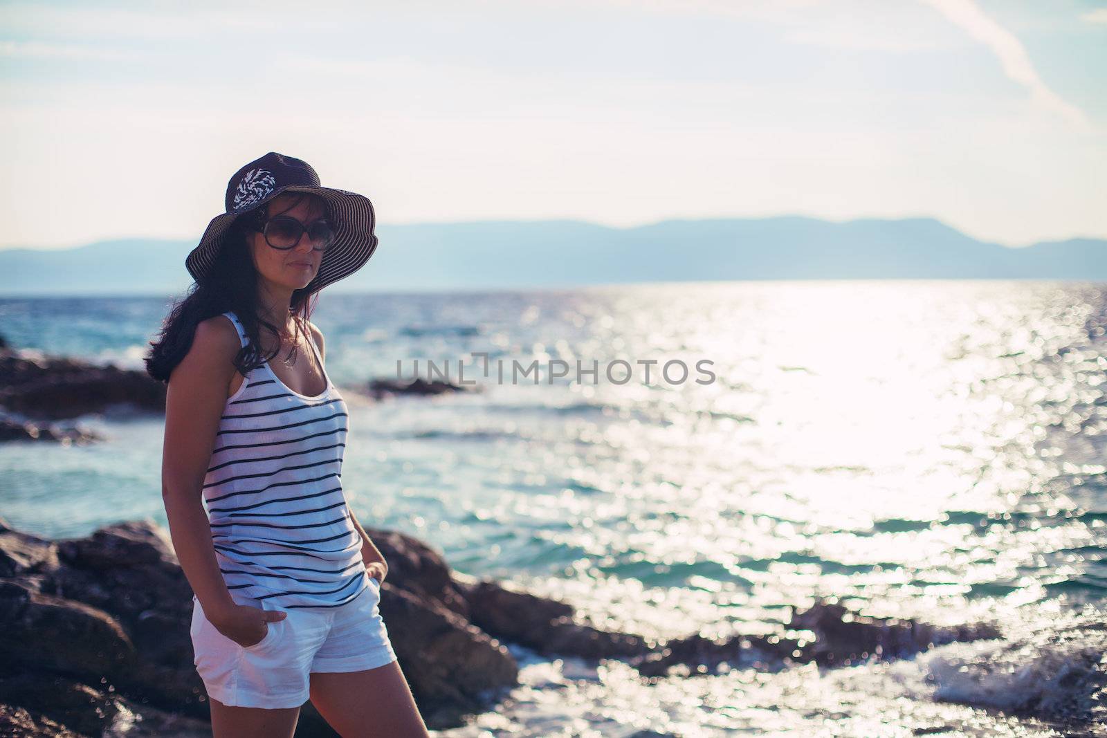 girl on the beach on the sunrise by Lemuana