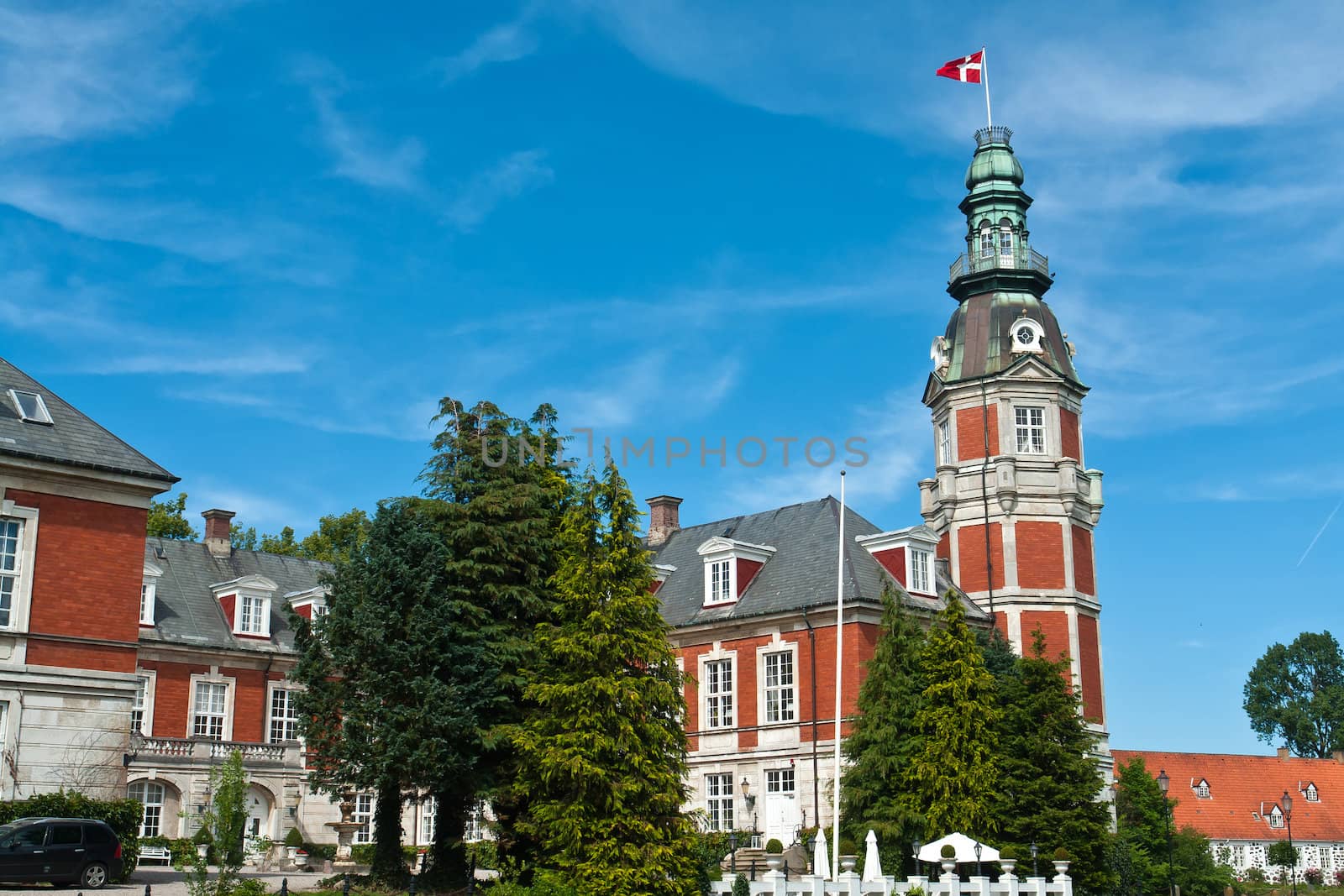 Hvedholm castle slot landmark fairy tale castle in Funen Denmark view of the main building