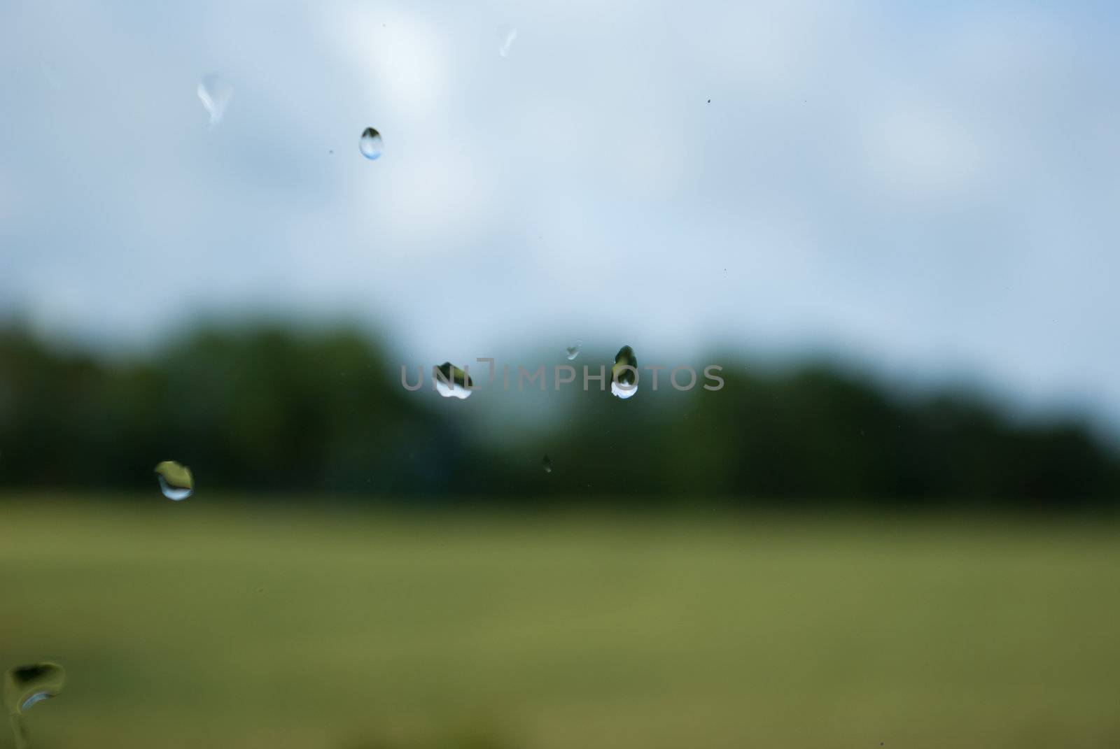Closeup view of water rain moist drops on window glass