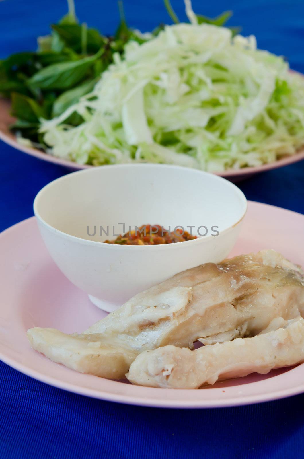  fresh steam fish served with chili sauce and vegetable