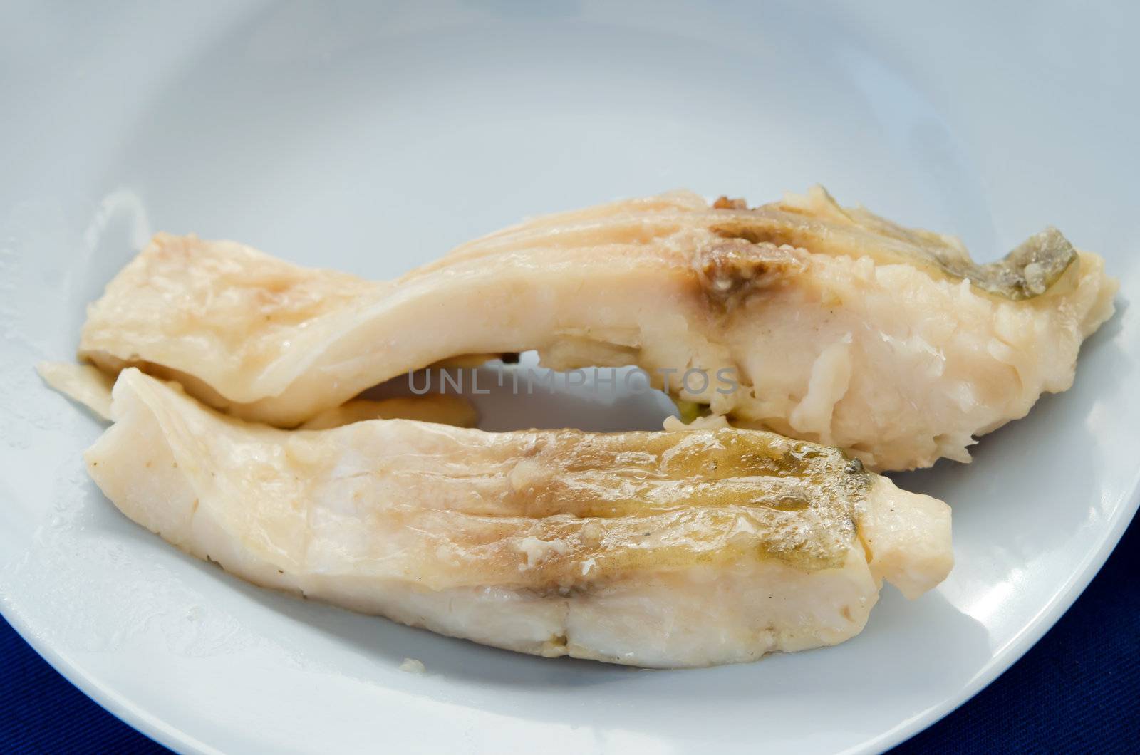 top view  fresh steam fish on blue dish