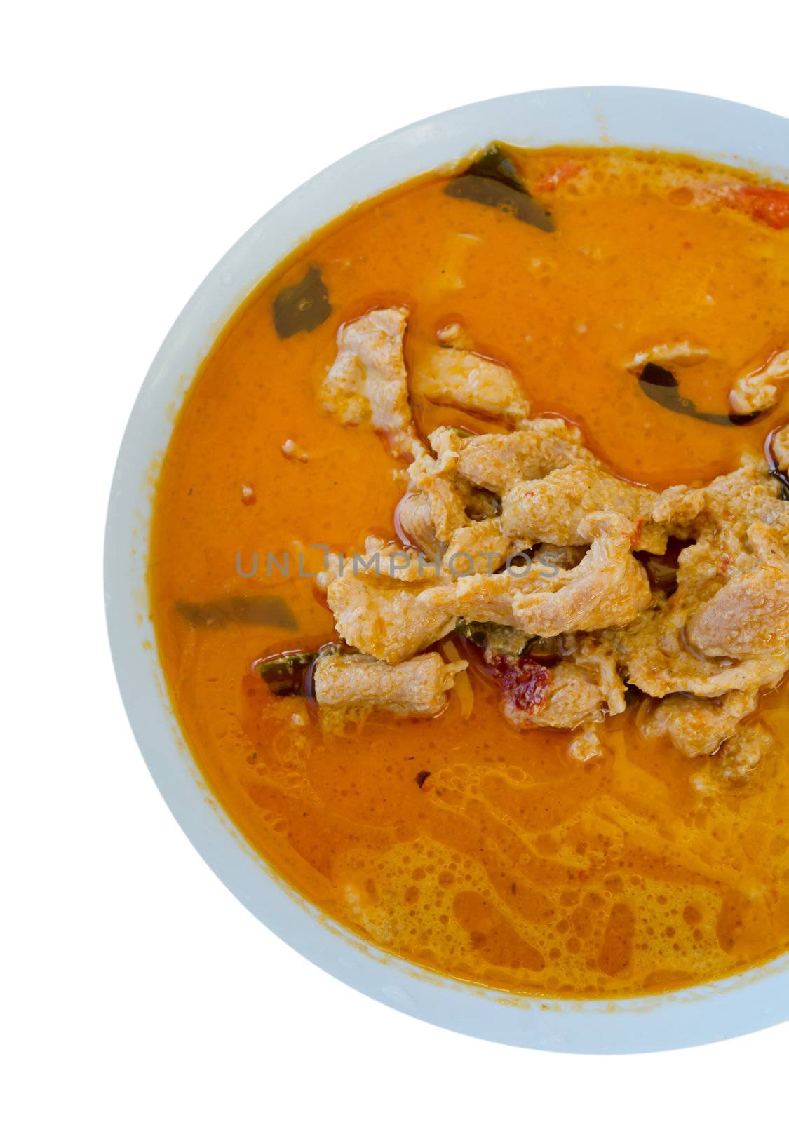  top view pork in ground peanut-coconut cream curry  on white background