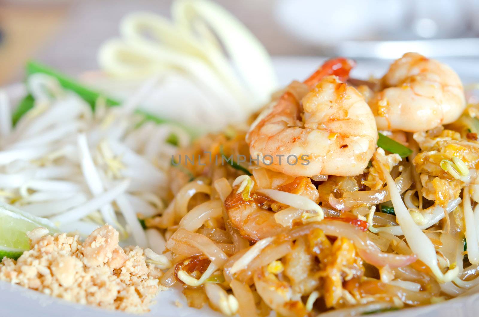 close up stir fry noodles with shrimp , egg  and vegetable 