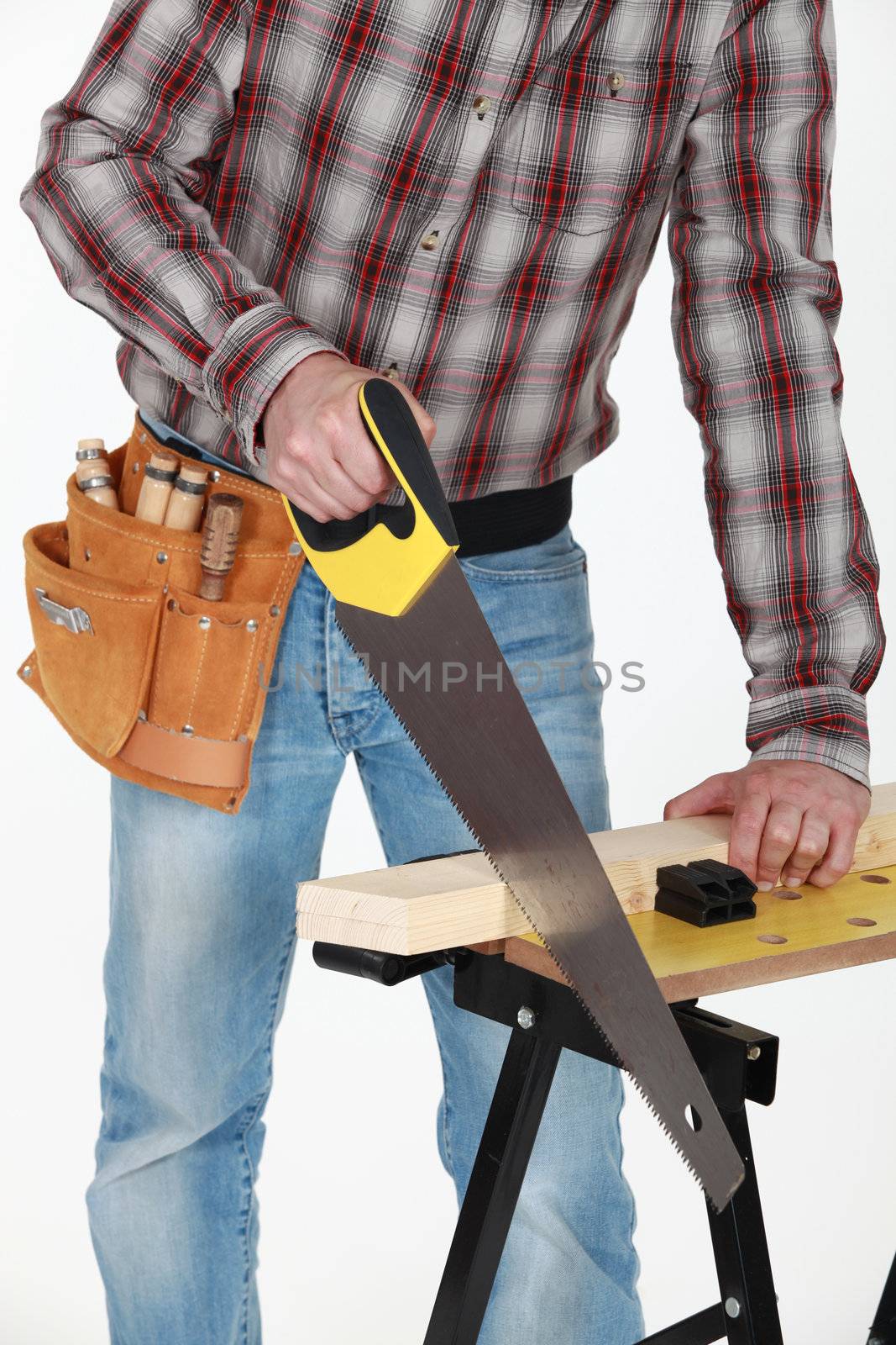 closeup on tradesman handling saw
