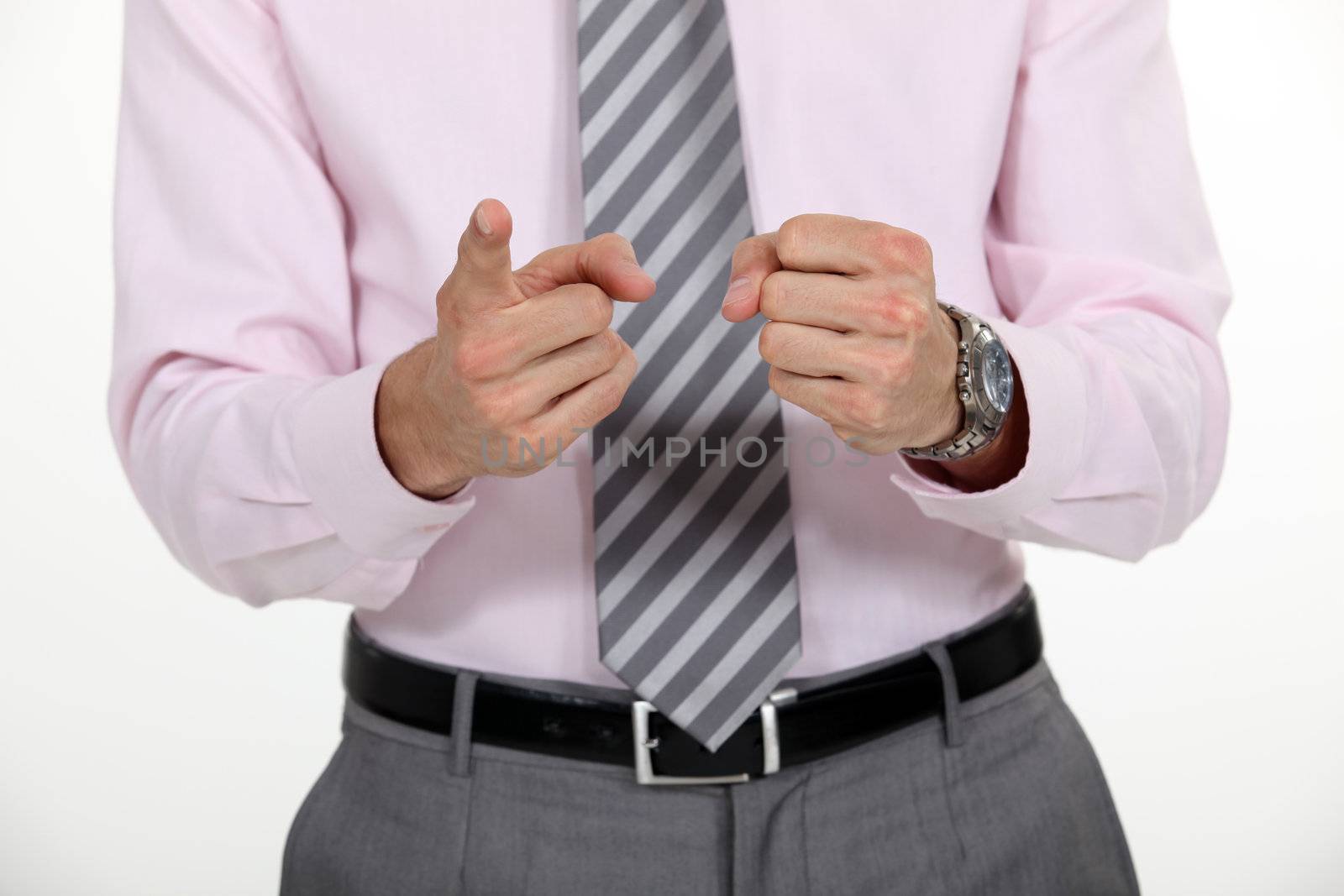 A cropped picture of a businessman counting on his fingers. by phovoir
