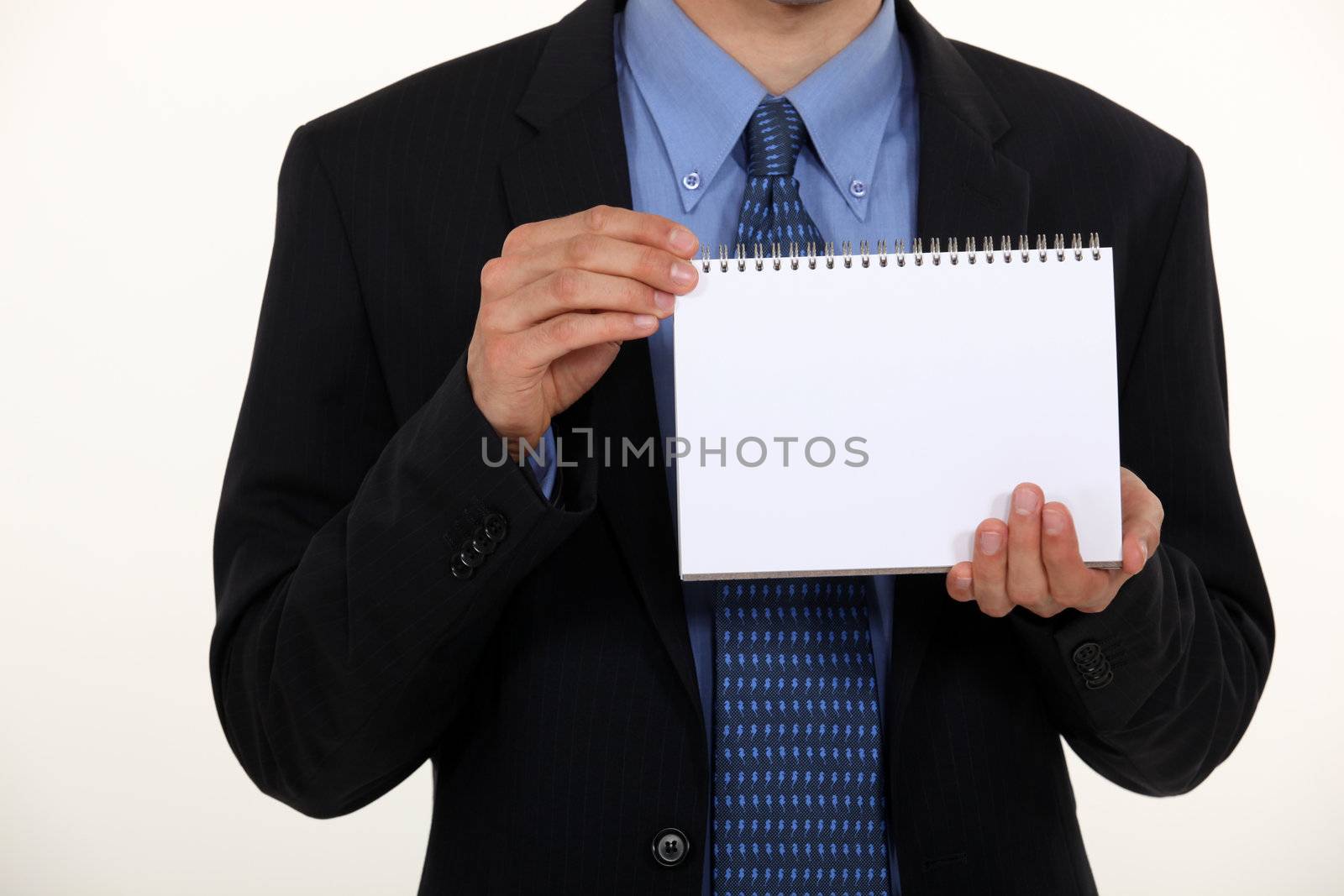 Man showing notebook