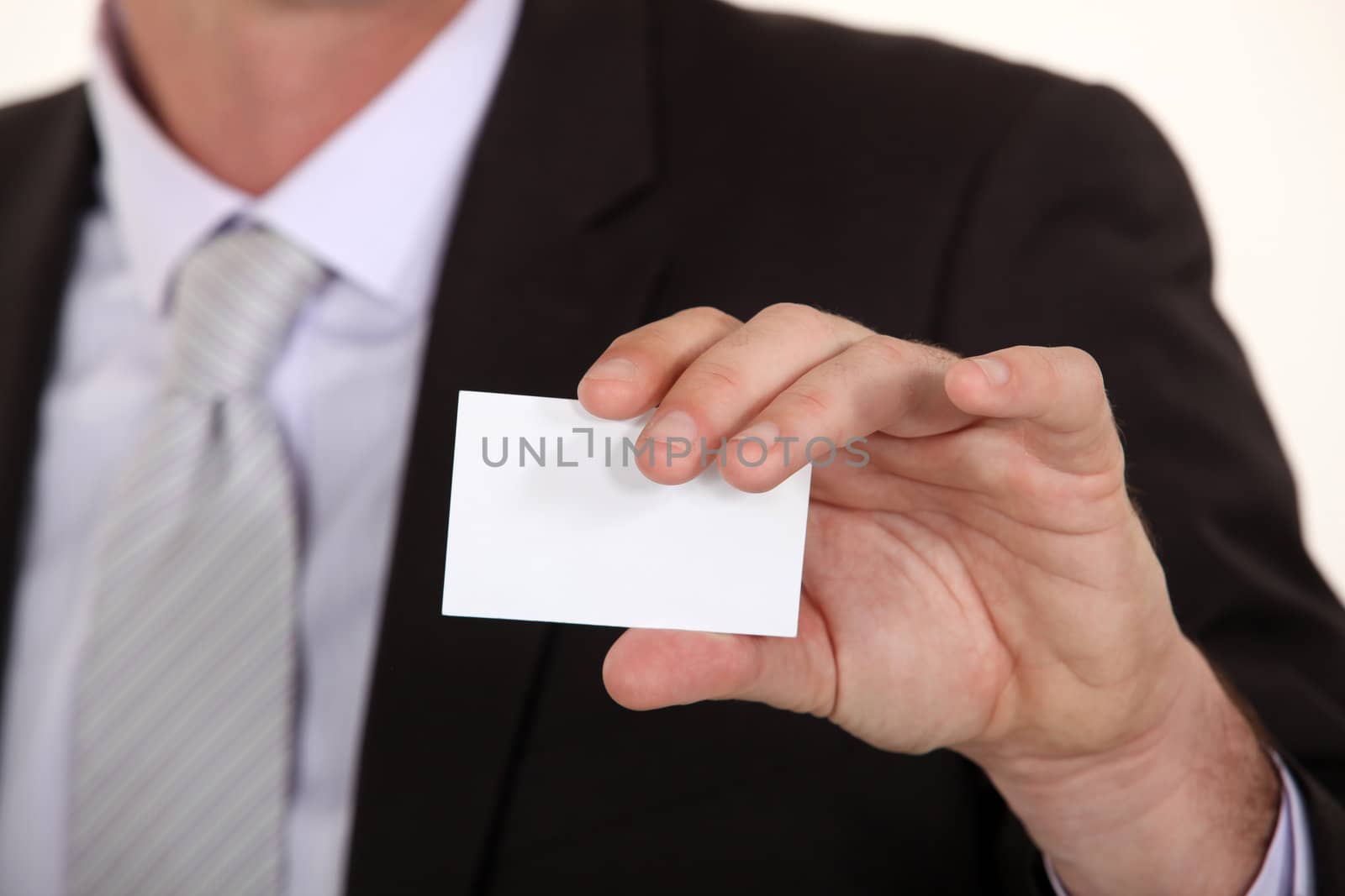 Man showing empty business card