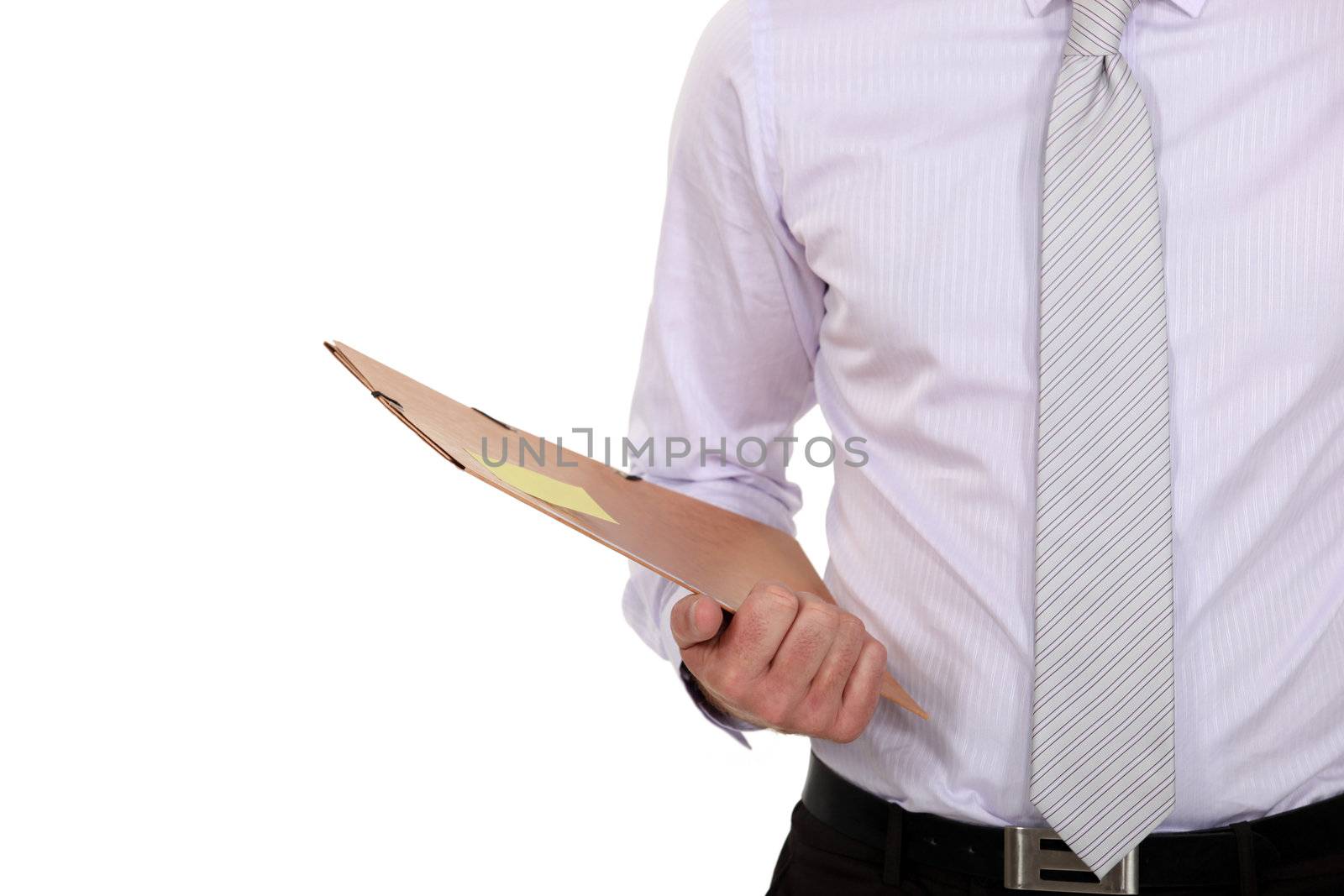 Businessman holding a document by phovoir