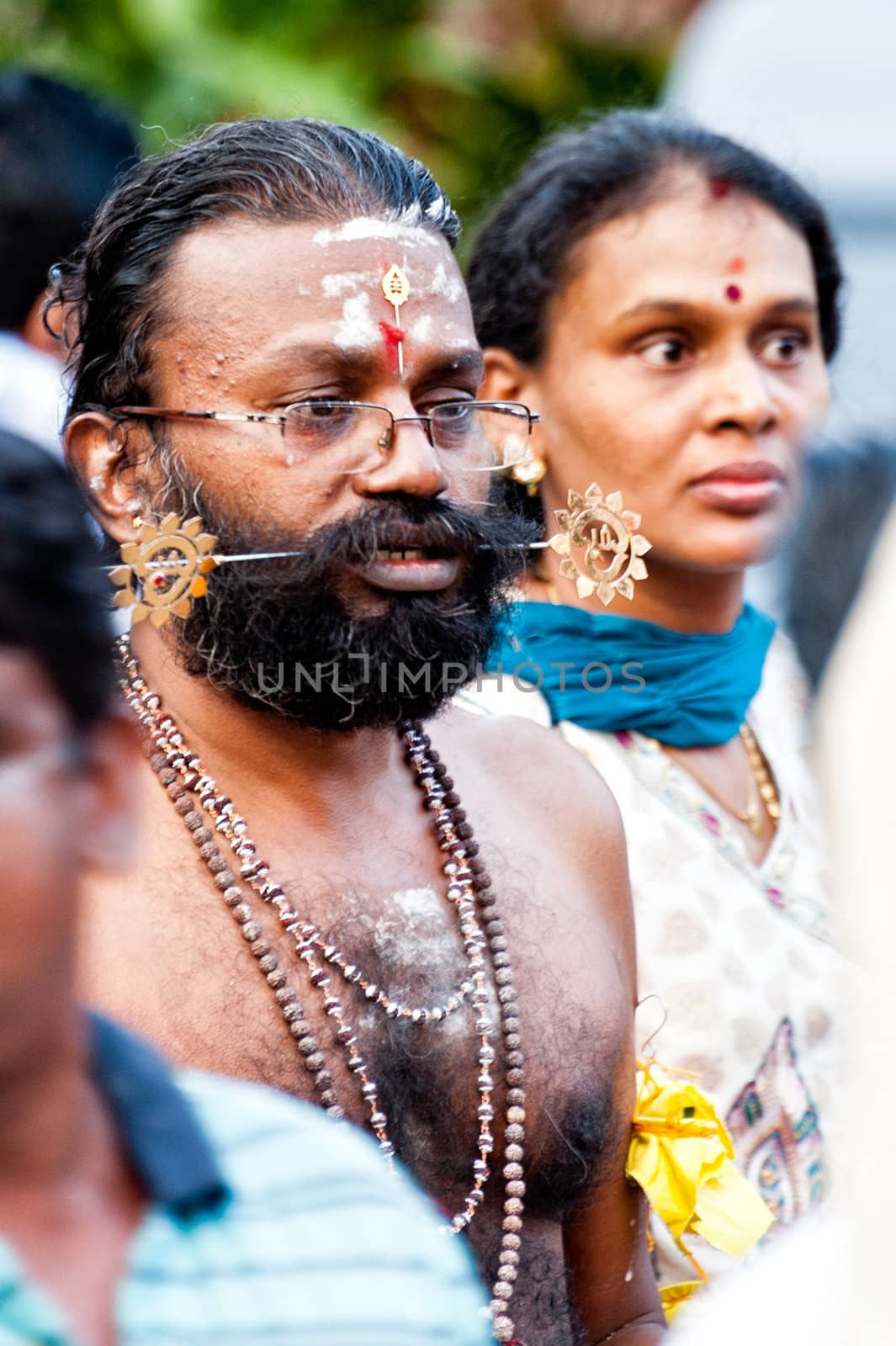 EDITORIAL USE ONLY!! SINGAPORE – 2013 JANUARY 27: Devotees at the annual Thaipusam processionin Singapore. Hindu festival to worship and to make offerings to the god Muruga.  2013 JANUARY 27