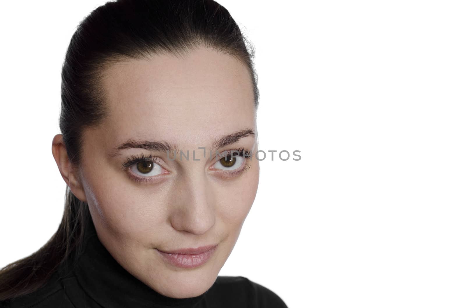 portrait of a beautiful brunette smiling on white background